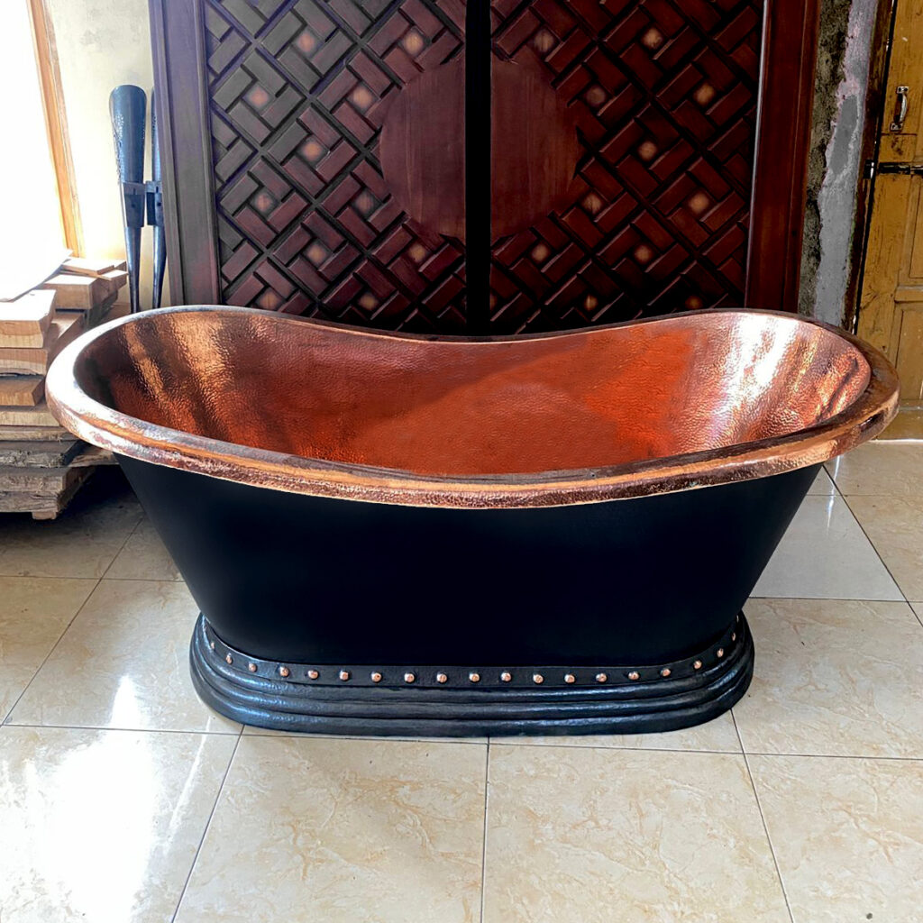 Elegant black opper soaking tub with hammered texture